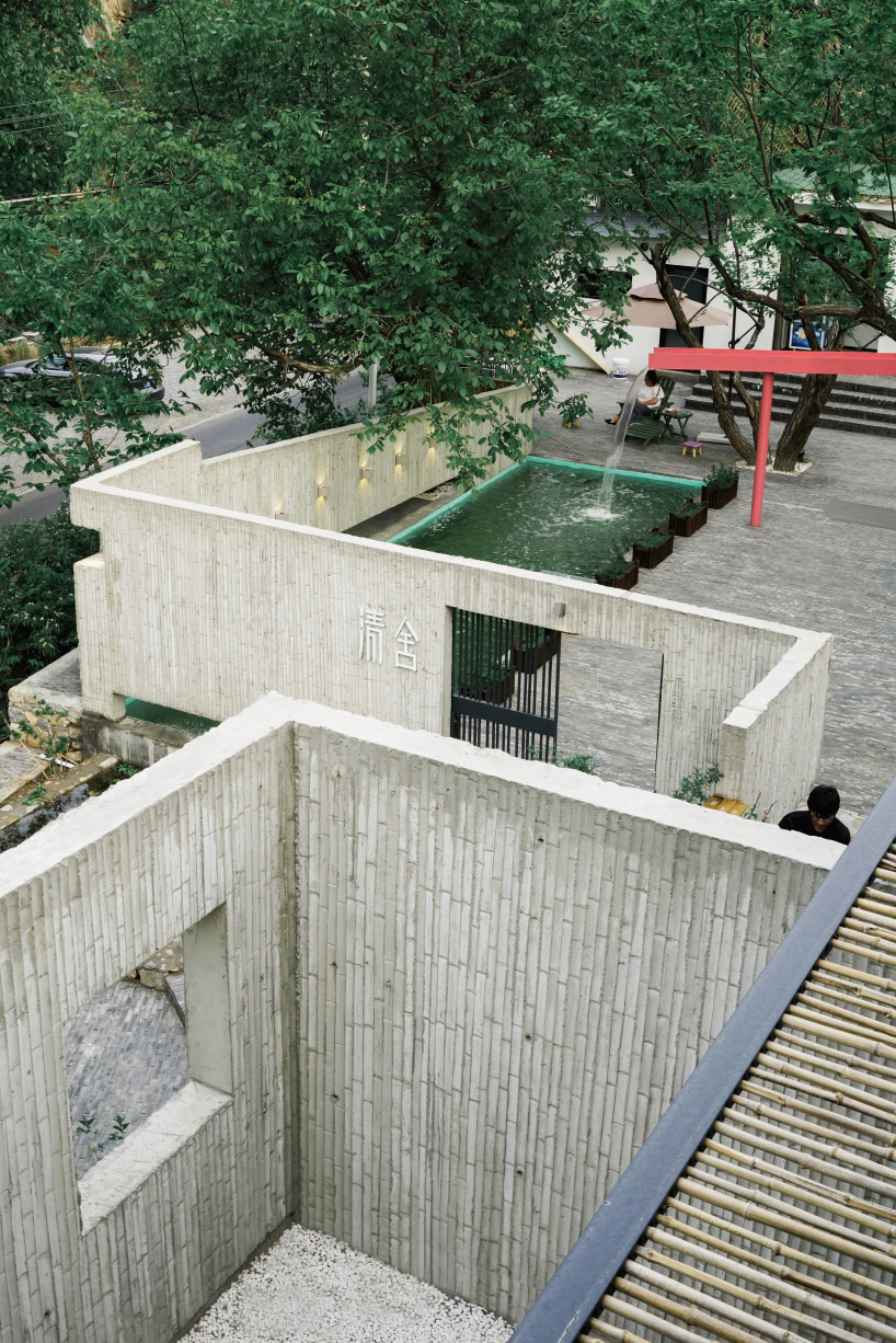 DL atelier uses bamboo-formed concrete walls to divide hotel courtyard in china