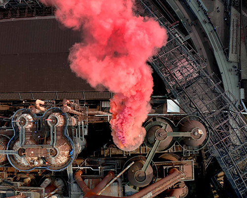 with red smoke grenades, SpY revitalizes derelict industrial smokestacks of völklingen