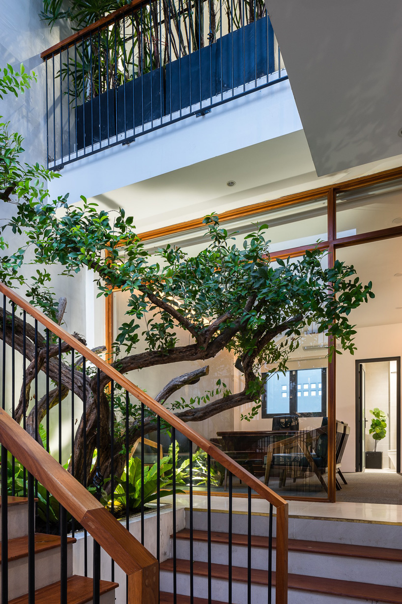 AD9 architects clads vietnamese office building in dynamic façade and greenery