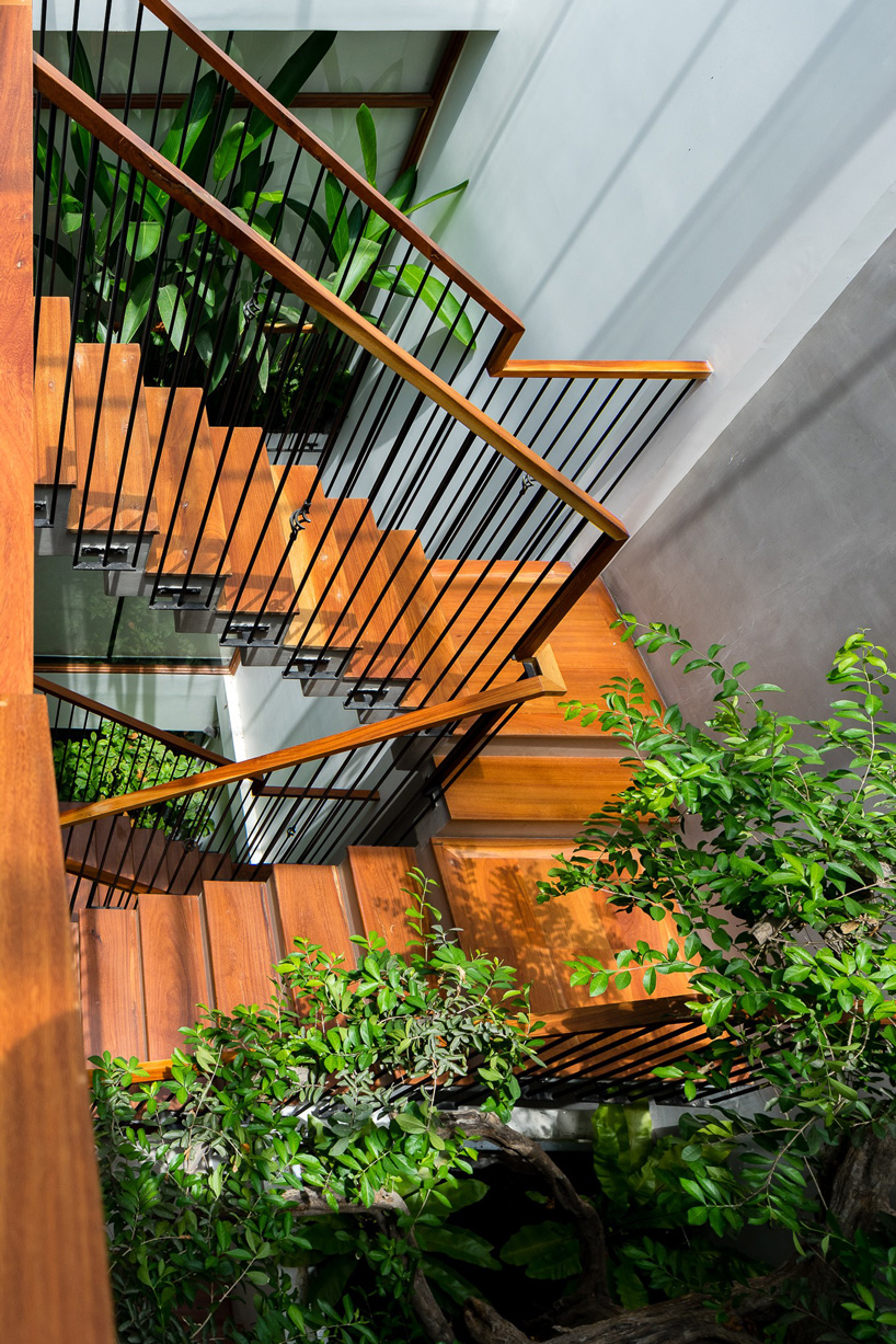 AD9 architects clads vietnamese office building in dynamic façade and greenery