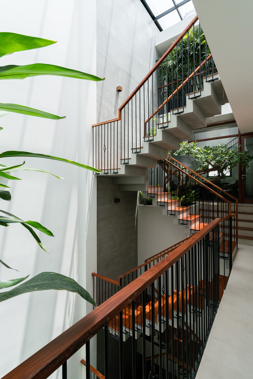 AD9 architects clads vietnamese office building in dynamic façade and greenery
