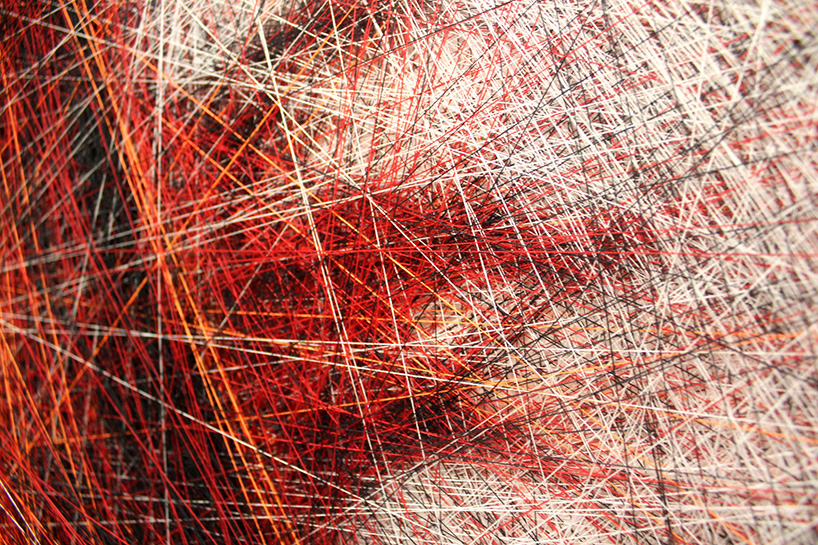 an algorithm and an artist carefully compose portraits from thousands of lines of thread