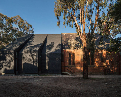 atelier wagner extends st.margaret's eltham church with black cantilevered canopy