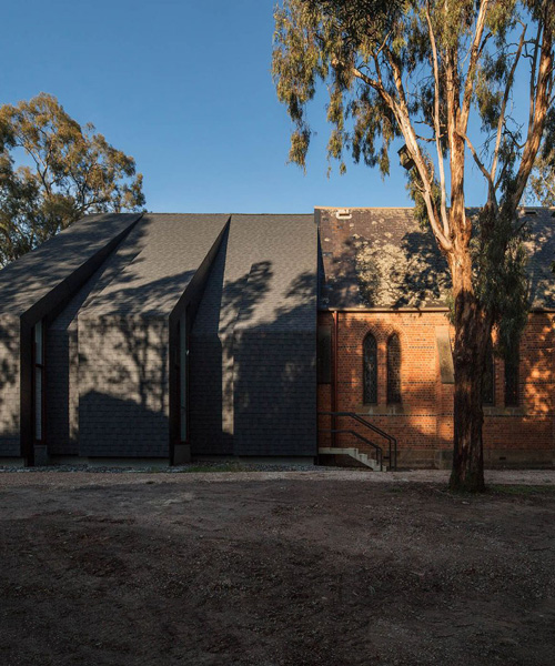 atelier wagner extends st.margaret's eltham church with black cantilevered canopy