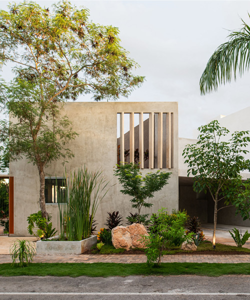 TACO sets concrete 'casa del lago' house by a lake in merida, mexico