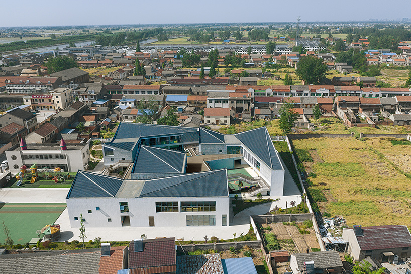 crossboundaries designs network of buildings to form village-like kindergarten in rural china