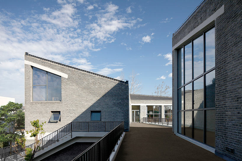 crossboundaries designs network of buildings to form village-like kindergarten in rural china