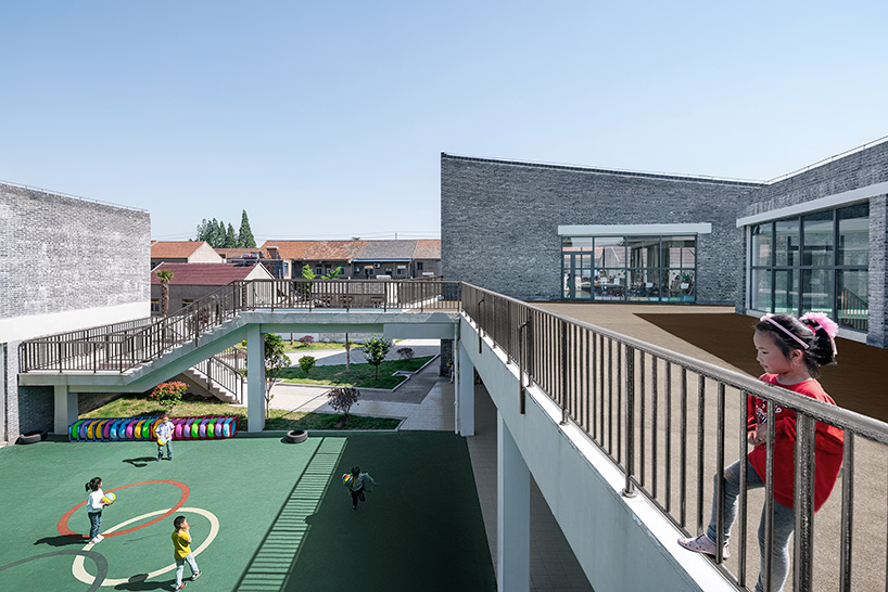 crossboundaries designs network of buildings to form village-like kindergarten in rural china