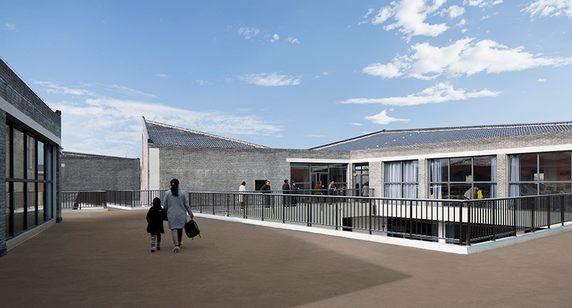 crossboundaries designs network of buildings to form village-like kindergarten in rural china