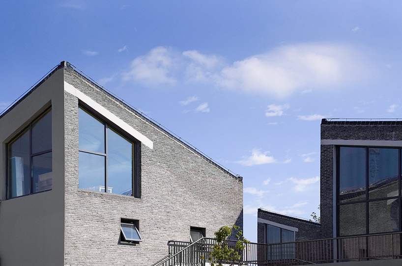 crossboundaries designs network of buildings to form village-like kindergarten in rural china