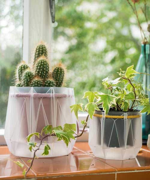flatpack origami plant pots are eco-friendly and water themselves