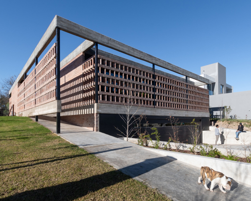 FLV arquitectura wraps argentinian residence in perforated brick façade