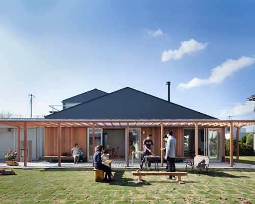 IN STUDIO builds wooden 'cultivatable' house for family of farmers in japan