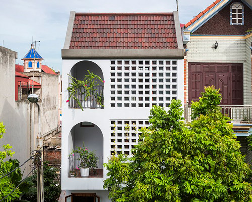 nh village architects includes rainwater collection system in vietnamese house