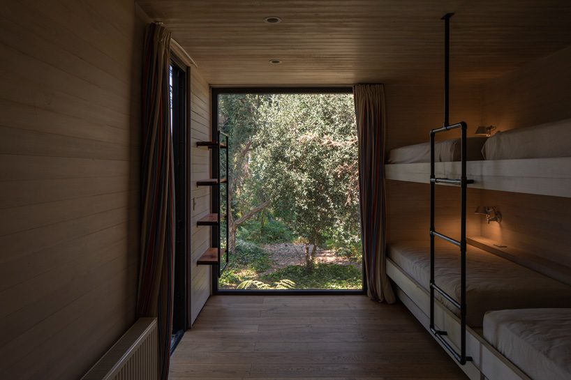 OF architects immerses the several pavilions of the mallarauco house within chilean forest