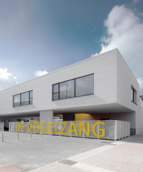 planomatic integrates volumetric primary school into belgian urban fabric