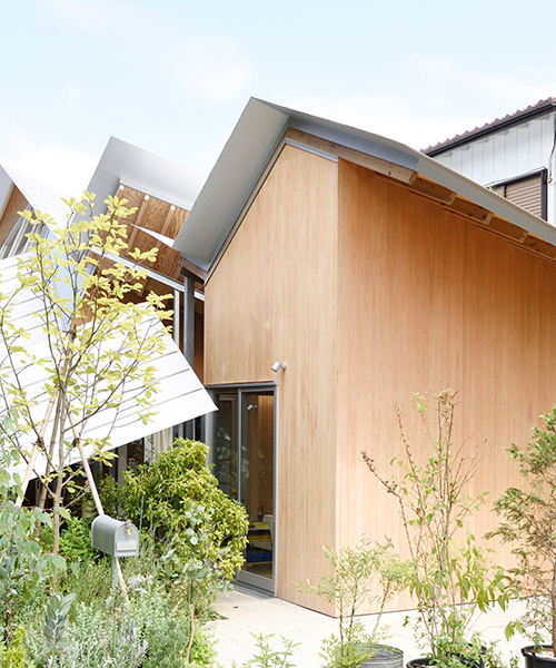 ryue nishizawa shapes terasaki house around massive roof in japan