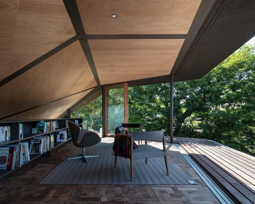 t-square design associates adds a transitional corridor linking a japanese house to nature