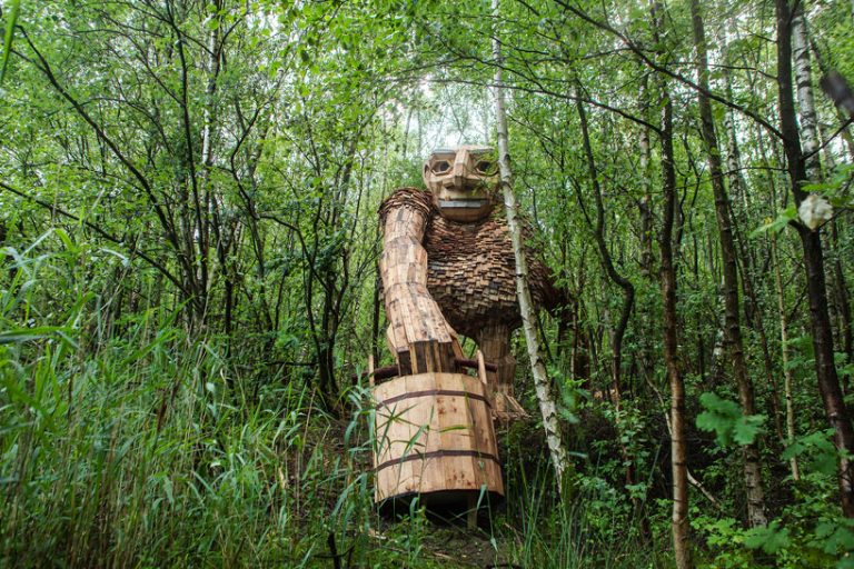 thomas dambo builds 7 giant trolls made from reclaimed wood in belgian ...