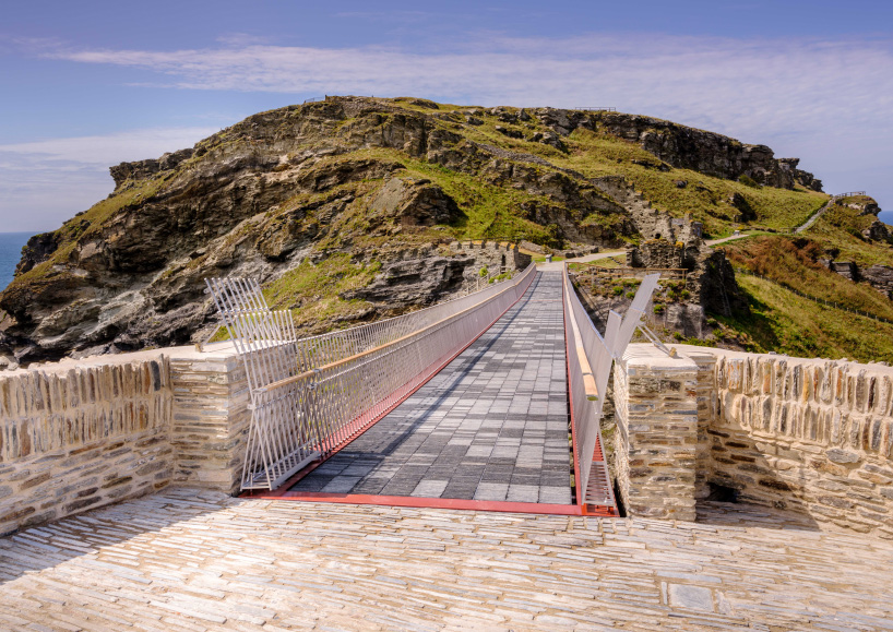 tintagel footbridge reunites historic cornwall castle for the first time in 500 years
