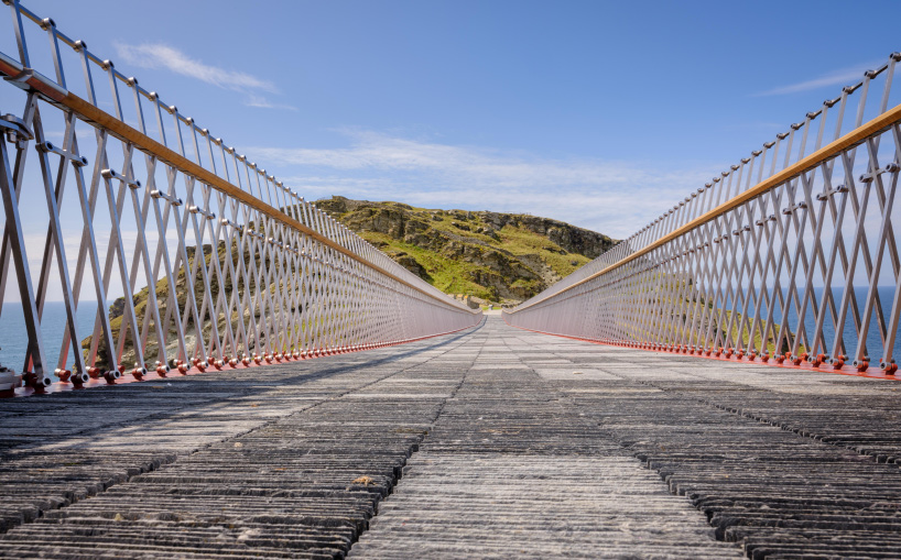 tintagel footbridge reunites historic cornwall castle for the first time in 500 years