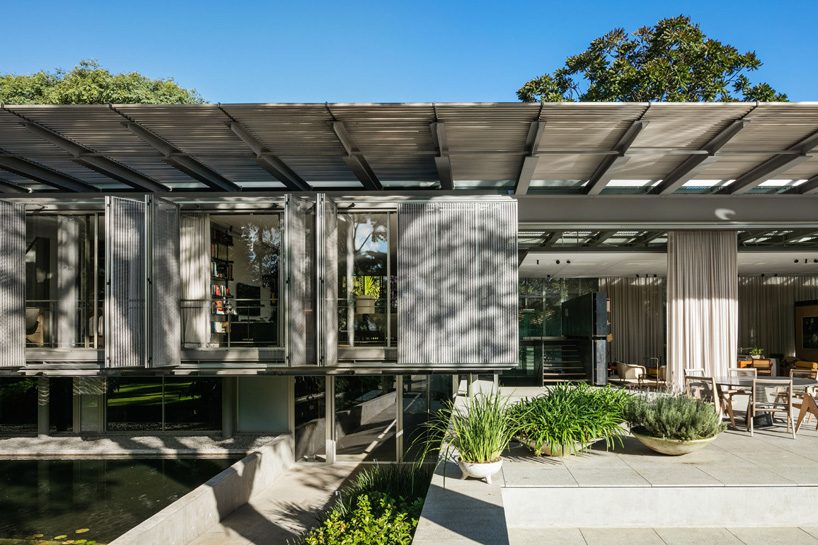 andrade morettin architects plans residence as a linear pavilion in são paulo
