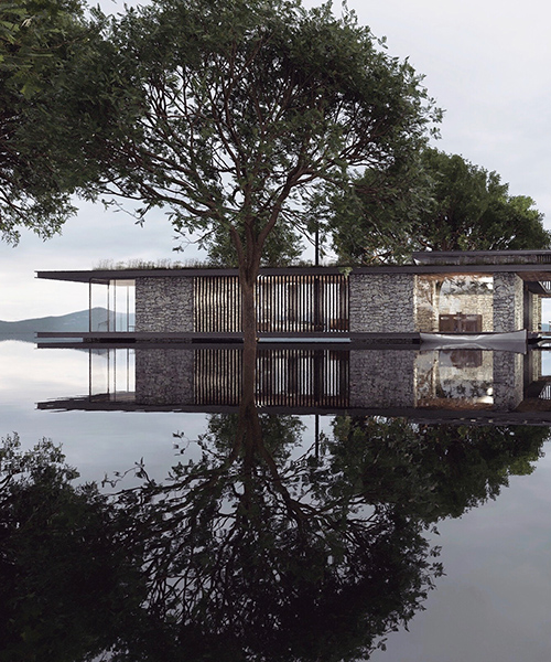 antony gibbon's latest vision 'loch eight' floats across a mirror lake