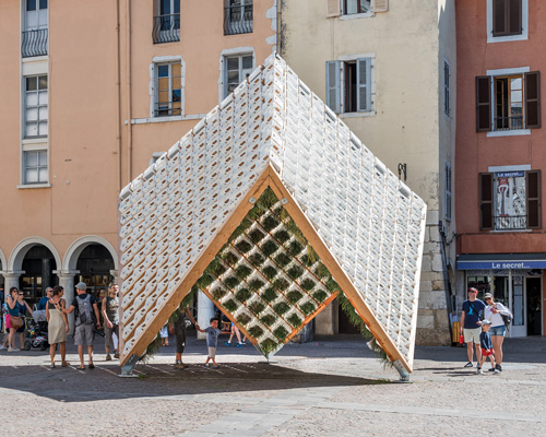 behin ha suspends a temporary inverted garden within the living pavilion in france