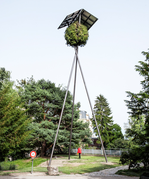 a giant birdhouse rises above lausanne to address soil scarcity in urban areas