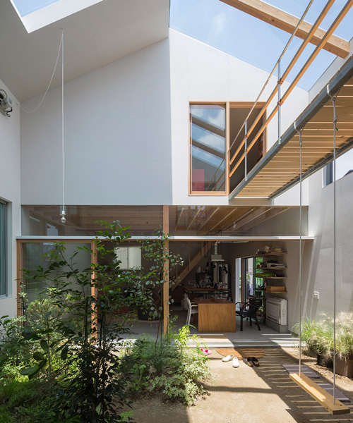 tato architects builds house in tsukimiyama, japan, around covered courtyard