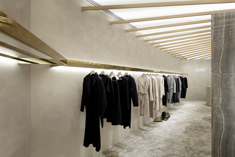 radial brass beams adorn japanese store designed by curiosity