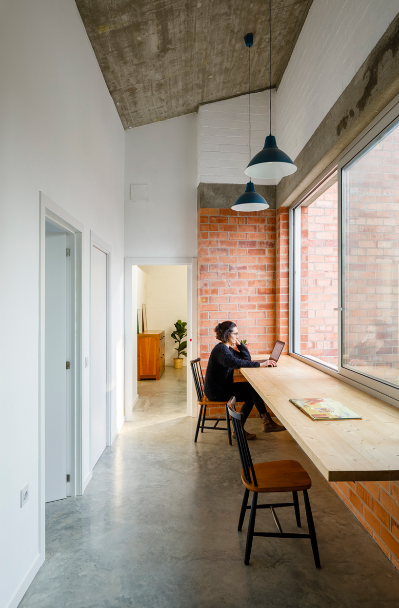 jesús perales builds casa almudena as an asymmetrical brick residence in spain