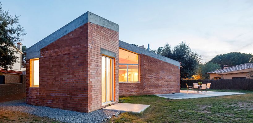 jesús perales builds casa almudena as an asymmetrical brick residence in spain
