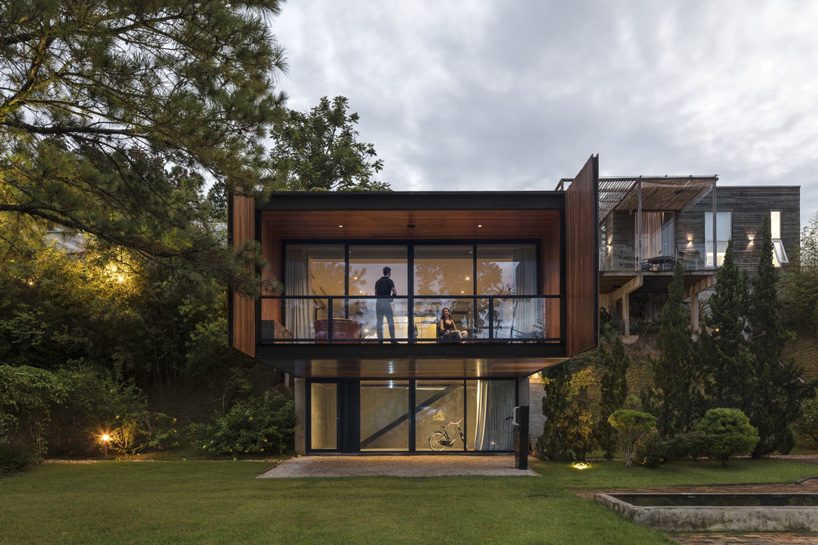 jobim carlevaro arquitetos finishes hotel suite in brazil with movable façade of wooden slats