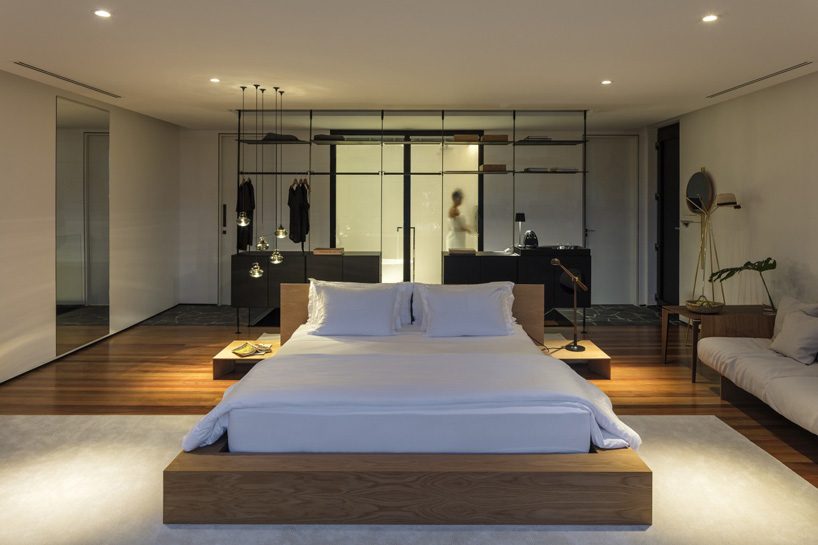 jobim carlevaro arquitetos finishes hotel suite in brazil with movable façade of wooden slats