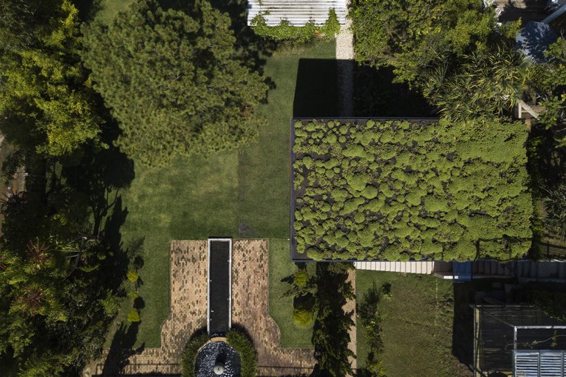 jobim carlevaro arquitetos finishes hotel suite in brazil with movable façade of wooden slats