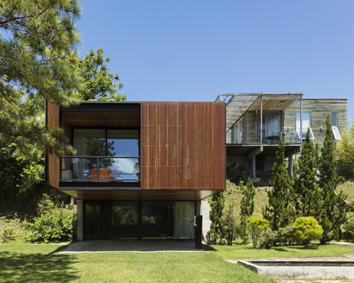 jobim carlevaro arquitetos finishes hotel suite in brazil with movable façade of wooden slats