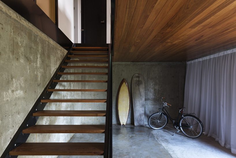 jobim carlevaro arquitetos finishes hotel suite in brazil with movable façade of wooden slats