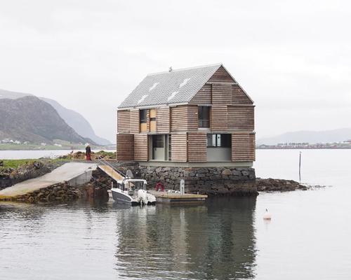 knut hjeltnes builds timber weekend house on a norwegian islet of its own