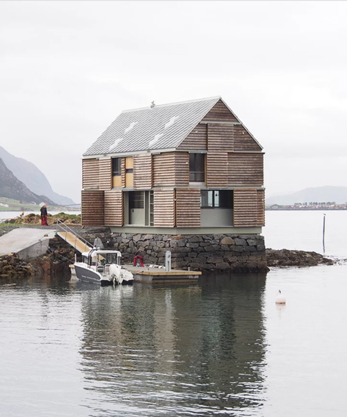 knut hjeltnes builds timber weekend house on a norwegian islet of its own