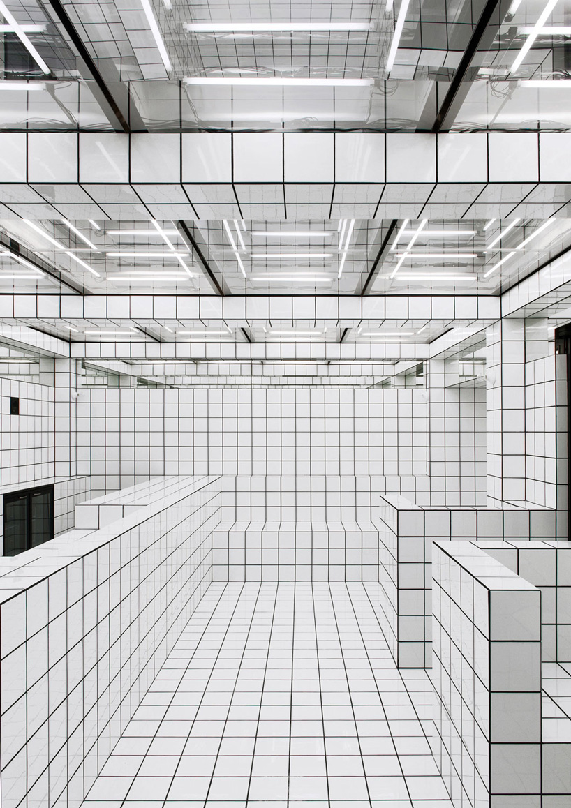  artist-designed LAX bar is built as a walk-in social sculpture of ceramic tiles, mirrors + neon