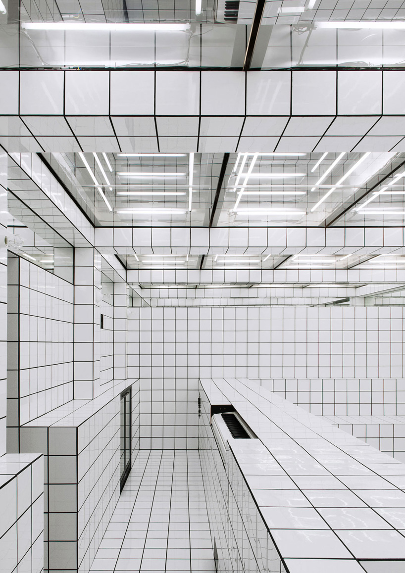  artist-designed LAX bar is built as a walk-in social sculpture of ceramic tiles, mirrors + neon