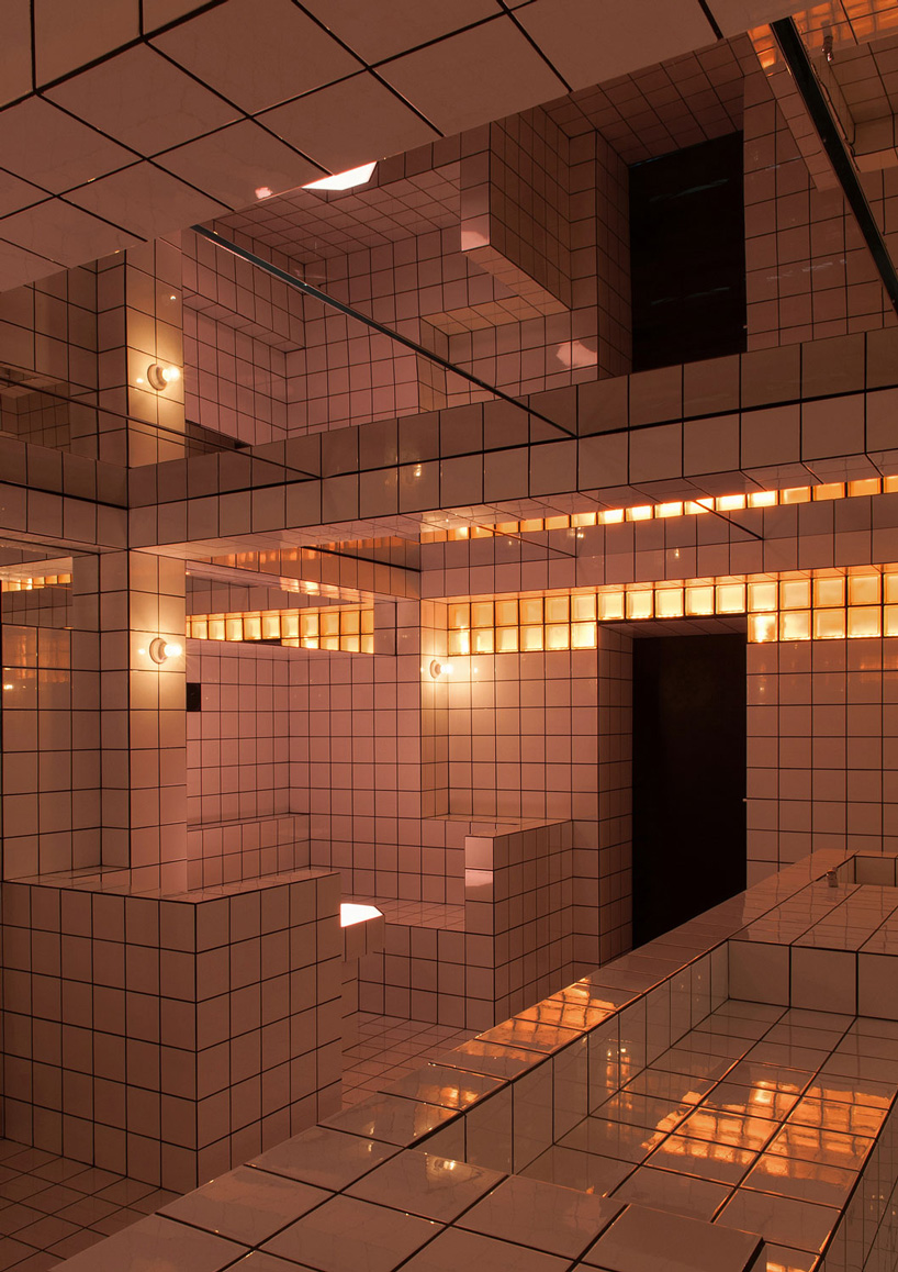  artist-designed LAX bar is built as a walk-in social sculpture of ceramic tiles, mirrors + neon