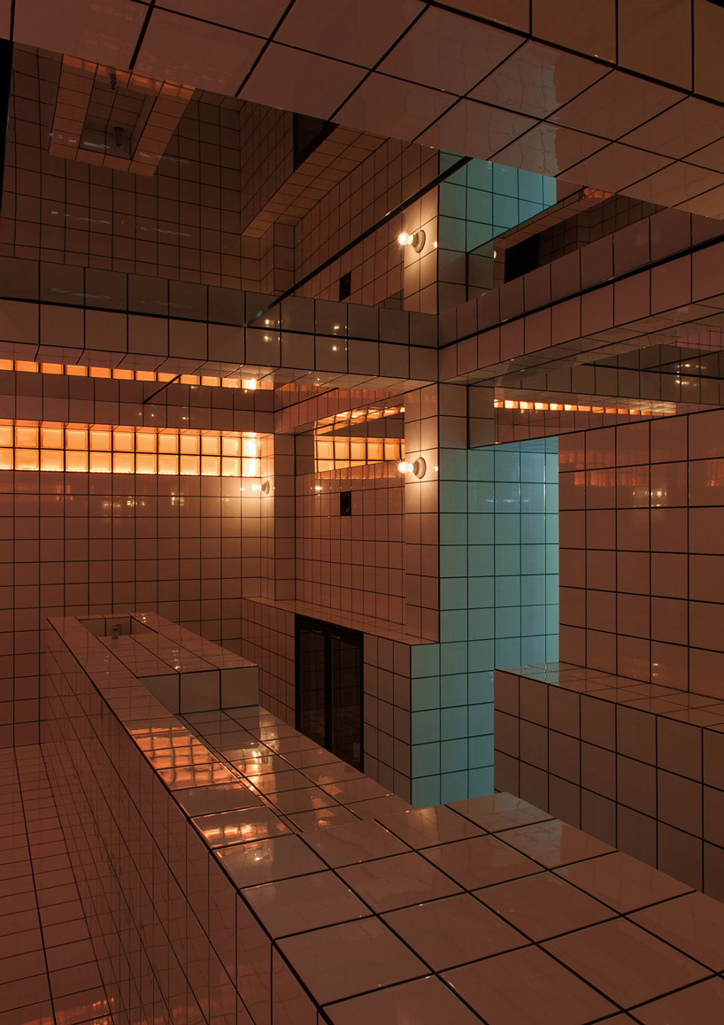 artist-designed LAX bar is built as a walk-in social sculpture of ceramic tiles, mirrors + neon