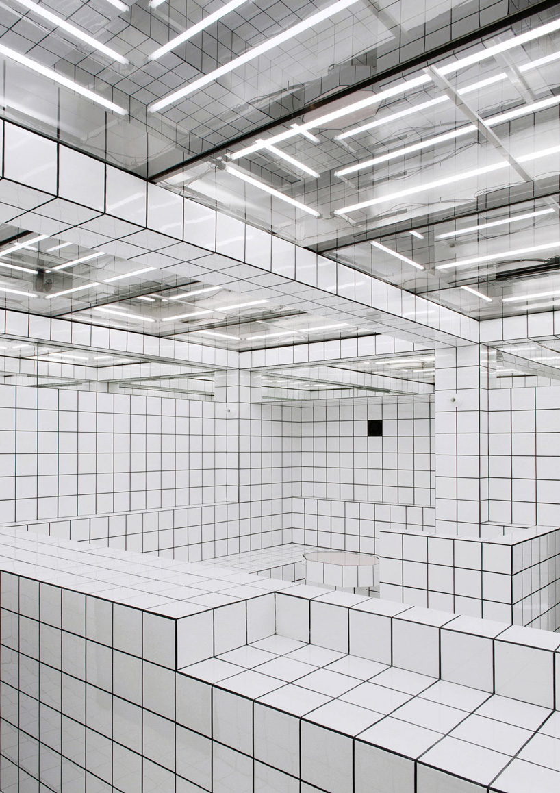  artist-designed LAX bar is built as a walk-in social sculpture of ceramic tiles, mirrors + neon