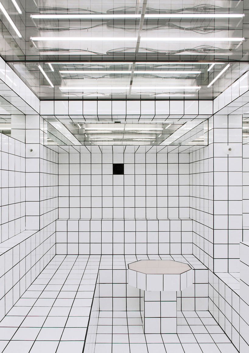 artist-designed LAX bar is built as a walk-in social sculpture of ceramic tiles, mirrors + neon