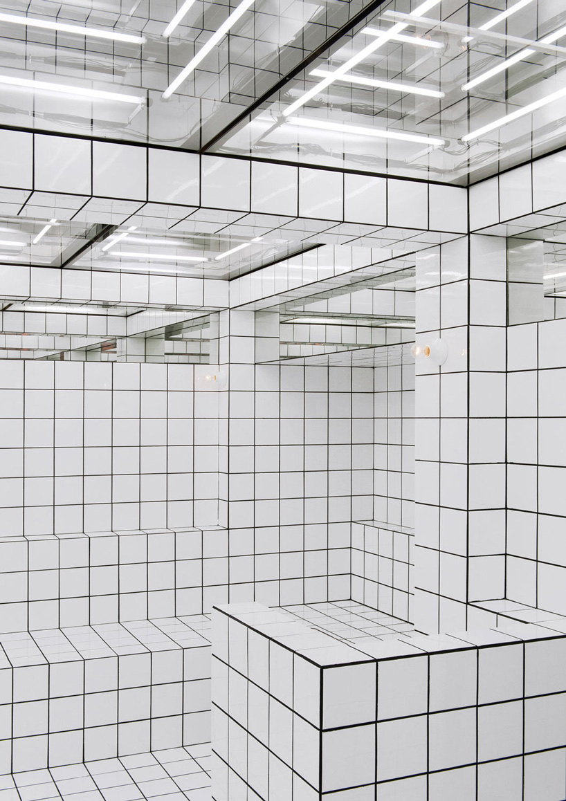  artist-designed LAX bar is built as a walk-in social sculpture of ceramic tiles, mirrors + neon