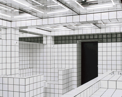 artist-designed LAX bar is built as a walk-in social sculpture of ceramic tiles, mirrors + neon