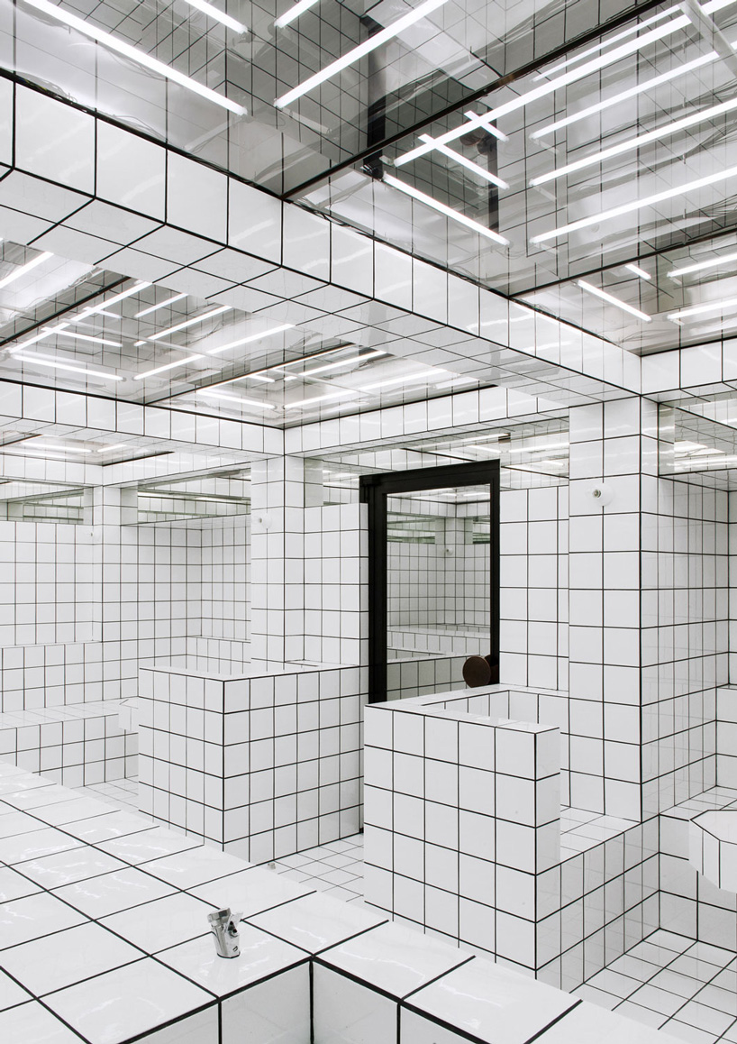  artist-designed LAX bar is built as a walk-in social sculpture of ceramic tiles, mirrors + neon