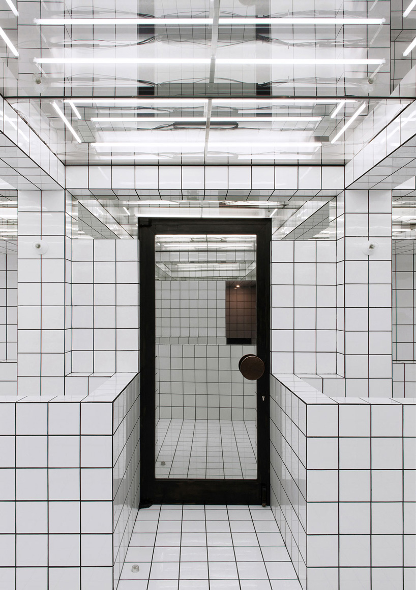 artist-designed LAX bar is built as a walk-in social sculpture of ceramic tiles, mirrors + neon